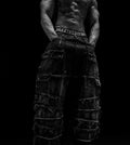 Oversized distressed denim cargo jeans
